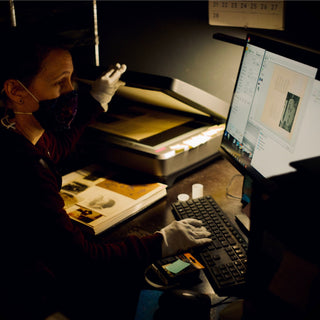 Melissa works on an archiving project for a customer at Photolab Berkeley