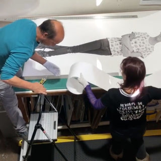 Technicians labor over big prints created to exacting measures at Photolab Berkeley.