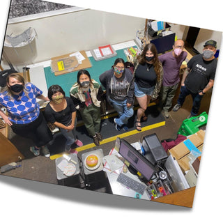 A top down view from the manager's loft of the professional staff at Photolab Berkeley