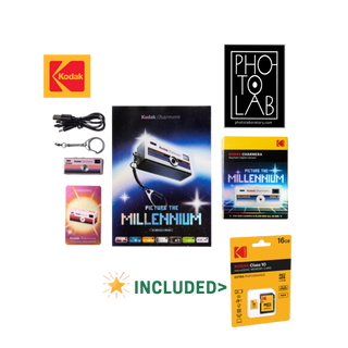A collage of Kodak-branded included items on a white background: a Kodak logo card, a black-and-white Photo Lab poster, a vintage-style projector package, a pink projector, a camera keychain, a Picture the Millennium card, a Kodak Chroma card, and a Kodak Class 10 SD card in retail packaging with an 'INCLUDED' star graphic below.