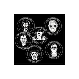 A square of circular black stickers featuring six illustrations of horror movie villains, including Dracula, Frankenstein, the Wolf of Wall Street, and others, with the text 'FILM PHOTOGRAPHY PROJECT' around each design.