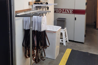 Dozens of orders of film negatives hanging on a rack at Photolab of Berkeley