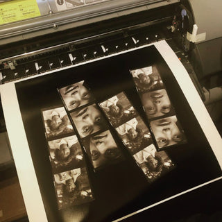 A big 40" contact sheet of black & white film printing at Photolab of Berkeley